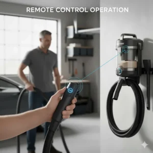 Showing a user using the convenient remote control switch on the hose handle of the wall garage vacuum to power it on/off.