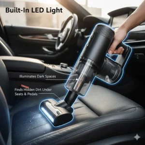 Built-in LED light on a handheld vacuum illuminating dark areas under car seats and pedals.