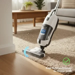 Top-down view of an upright vacuum cleaning allergens along baseboards and corners.