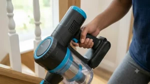 Close-up of an ergonomic handle design on a vacuum for stairs.