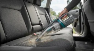 Portable handheld vacuum featuring a high-efficiency HEPA filter cleaning car upholstery.