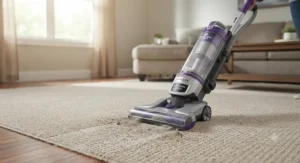A standard upright regular vacuum cleaner effectively cleaning residential carpeting.