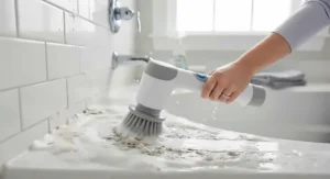 Rechargeable electric bathroom scrubber for tile and grout removing stubborn soap scum