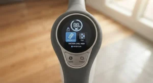 The LED control panel of a multi-surface cleaning machine for hardwood and tile showing battery life and cleaning modes.