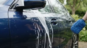Paint-safe washing suds sliding off a vehicle using a foam cannon for car detailing pressure washers