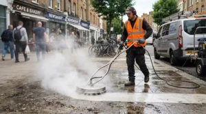 Surface cleaning concrete with a portable hot water pressure washer for contractors
