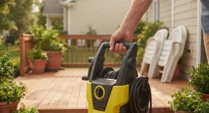 Illustration emphasizing the comfortable carrying handle of a portable light-duty electric pressure washer for backyard patio furniture.